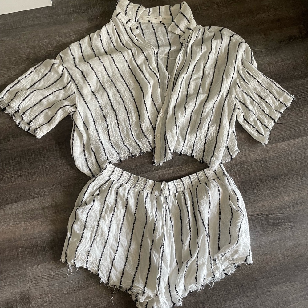 Black and white striped matching top and short set. Never been worn.